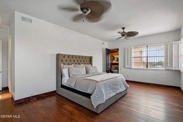 6006 Balcones Ct Unit 19, El Paso, TX 79912 - bedroom featuring baseboards, wood-type flooring, and a ceiling fan