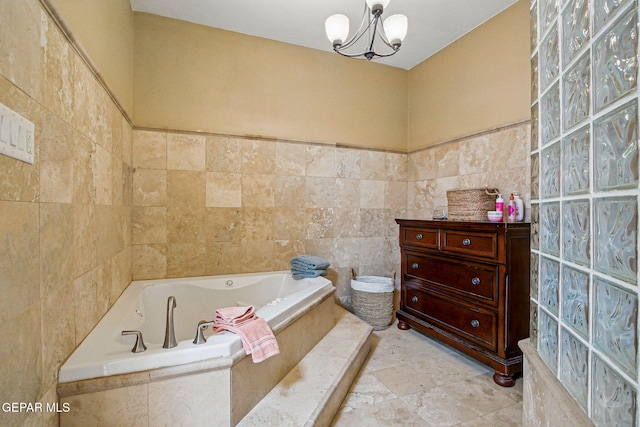 6006 Balcones Ct Unit 19, El Paso, TX 79912 - full bathroom with tile walls, a garden tub, and a chandelier