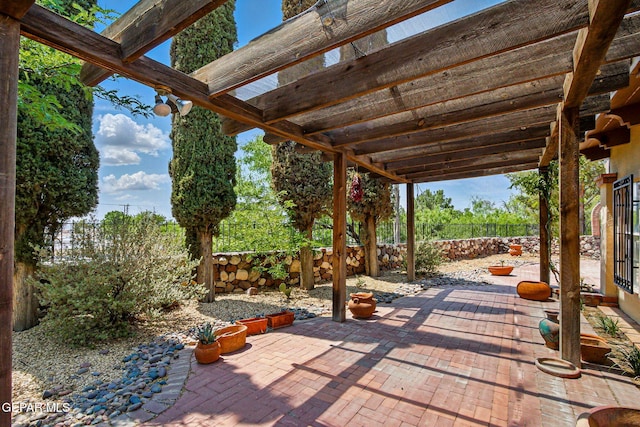 6006 Balcones Ct Unit 19, El Paso, TX 79912 - fenced backyard with a patio area