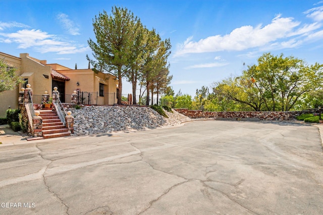 6006 Balcones Ct Unit 19, El Paso, TX 79912 - view of patio / terrace featuring stairway