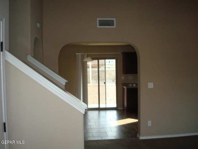 12036 Copper Hill Pl, El Paso, TX 79934 - tiled foyer entrance with arched walkways and baseboards