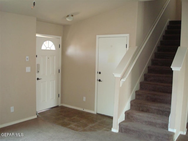 12036 Copper Hill Pl, El Paso, TX 79934 - carpeted entrance foyer featuring stairway and baseboards