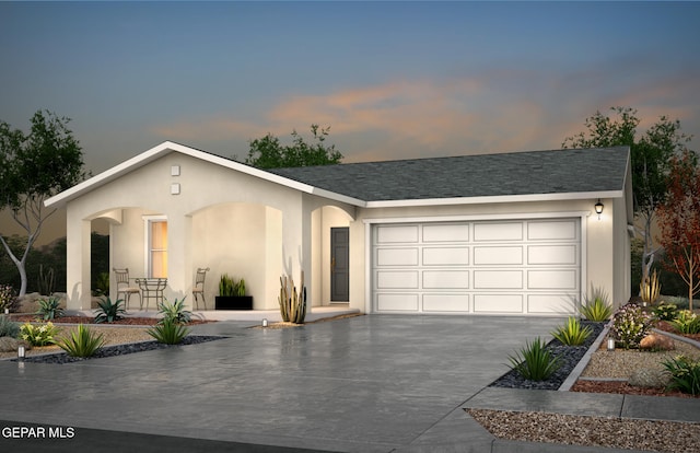 1364 Indigo Sky St, Horizon City, TX 79928 - view of front of property featuring concrete driveway, a garage, and stucco siding