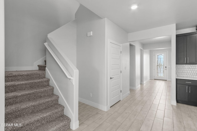 2232 Rocky Terrace Place, El Paso, TX 79911 - stairs featuring baseboards and wood finished floors