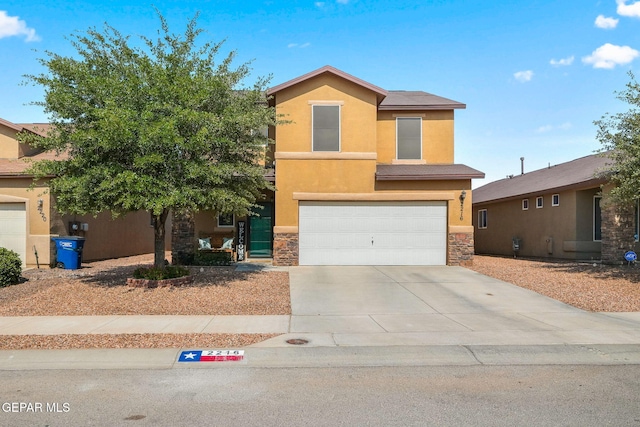 2216 Azure Point Ave, El Paso, TX 79938 - view of front of home featuring stucco siding, an attached garage, concrete driveway, and stone siding