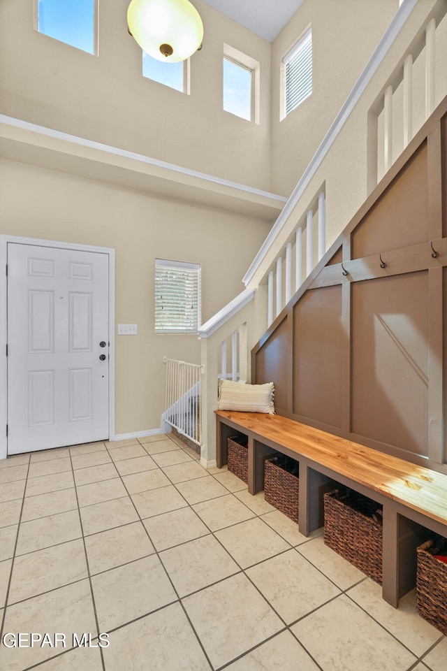 2216 Azure Point Ave, El Paso, TX 79938 - tiled entrance foyer with a high ceiling, plenty of natural light, and baseboards