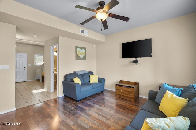 2216 Azure Point Ave, El Paso, TX 79938 - living area featuring wood finished floors, a ceiling fan, and baseboards