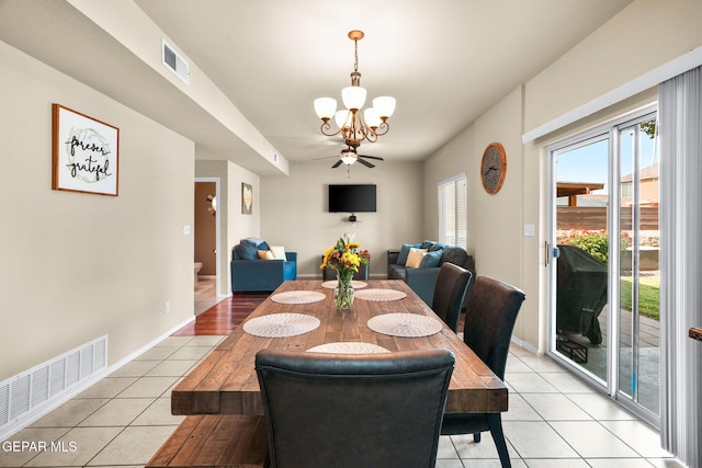 2216 Azure Point Ave, El Paso, TX 79938 - dining room featuring light tile patterned flooring, a chandelier, and baseboards