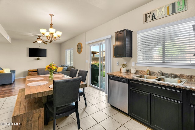 2216 Azure Point Ave, El Paso, TX 79938 - dining area with a chandelier, light tile patterned flooring, and ceiling fan