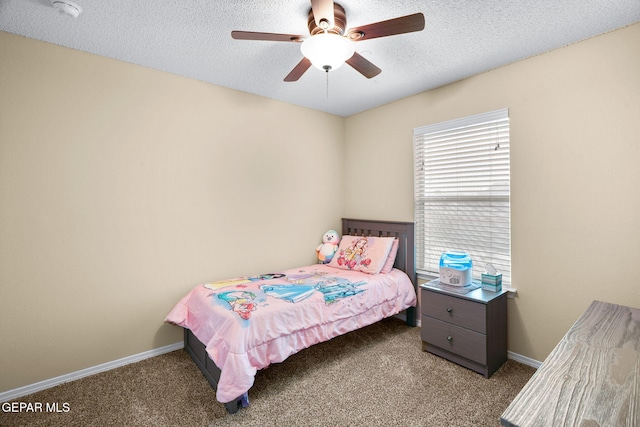2216 Azure Point Ave, El Paso, TX 79938 - bedroom with carpet, a textured ceiling, baseboards, and a ceiling fan