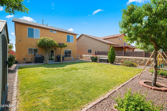2216 Azure Point Ave, El Paso, TX 79938 - rear view of house featuring a patio and stucco siding