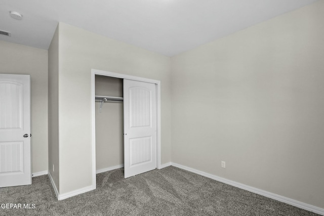 3916 Aspiration, El Paso, TX 79938 - unfurnished bedroom with carpet flooring, baseboards, and a closet