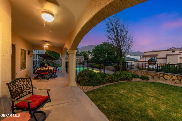 6308 Franklin Vis, El Paso, TX 79912 - patio terrace at dusk featuring a patio area