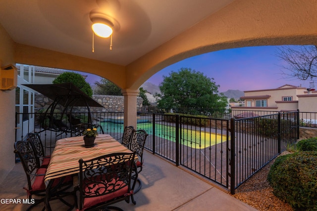 6308 Franklin Vis, El Paso, TX 79912 - patio terrace at dusk featuring a patio area