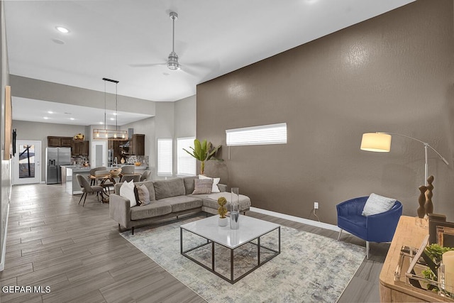 3936 Aspiration, El Paso, TX 79938 - living room featuring ceiling fan, light wood-style floors, recessed lighting, and baseboards