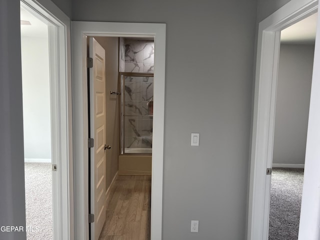 497 Plateau Dr, Socorro, TX 79927 - hall featuring baseboards and wood finished floors