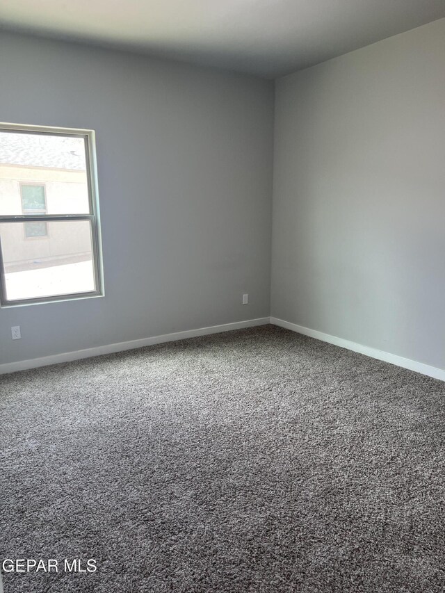 497 Plateau Dr, Socorro, TX 79927 - unfurnished room with carpet floors and baseboards