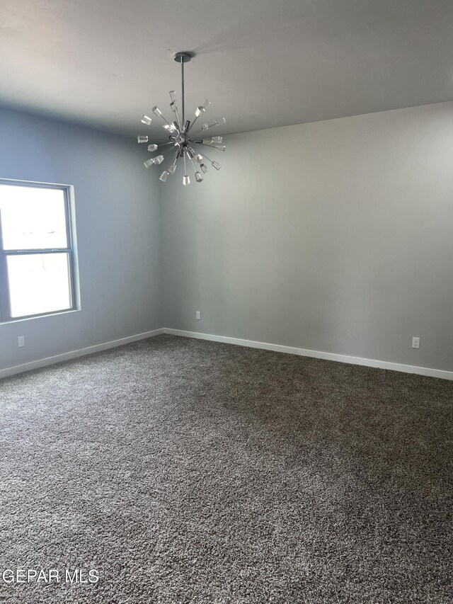 497 Plateau Dr, Socorro, TX 79927 - carpeted spare room featuring a chandelier and baseboards