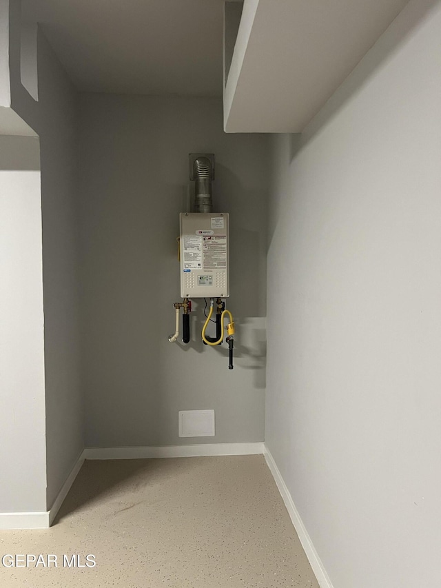 497 Plateau Dr, Socorro, TX 79927 - utility room featuring water heater