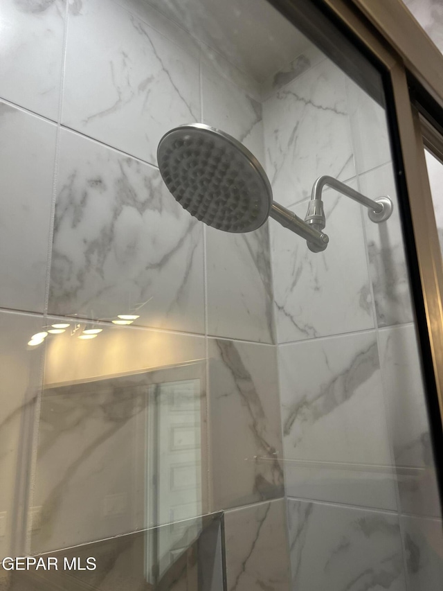 497 Plateau Dr, Socorro, TX 79927 - bathroom view of a marble finish shower