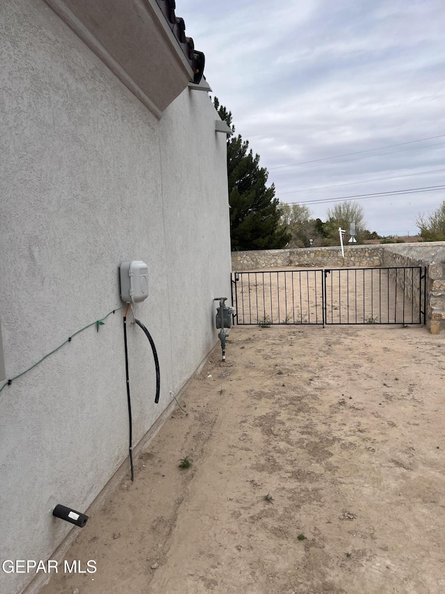 497 Plateau Dr, Socorro, TX 79927 - view of side of property with stucco siding
