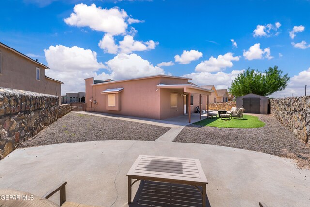 2297 Lisa Sherr St, El Paso, TX 79938 - rear view of property with a patio area, stucco siding, and a fenced backyard