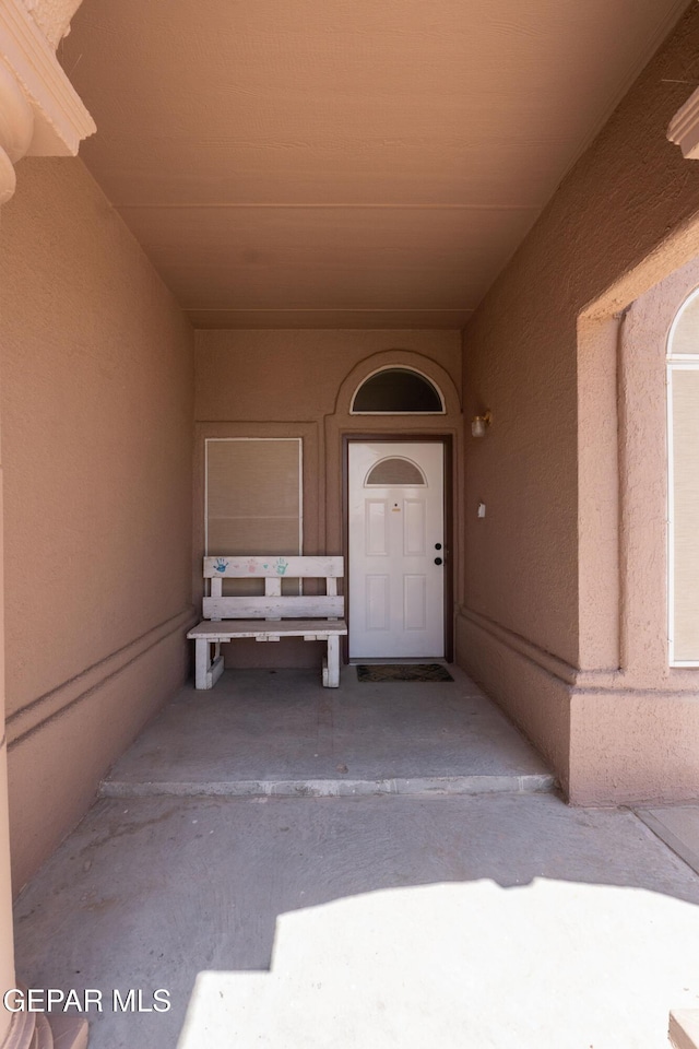 2297 Lisa Sherr St, El Paso, TX 79938 - doorway to property with stucco siding