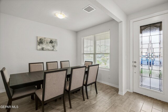 1669 Sam Dominguez, El Paso, TX 79928 - dining space with baseboards and light wood finished floors