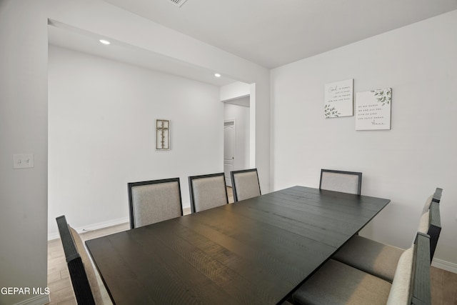 1669 Sam Dominguez, El Paso, TX 79928 - unfurnished dining area featuring wood finished floors, recessed lighting, and baseboards