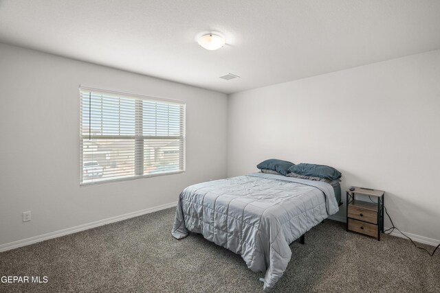 1669 Sam Dominguez, El Paso, TX 79928 - bedroom featuring carpet and baseboards