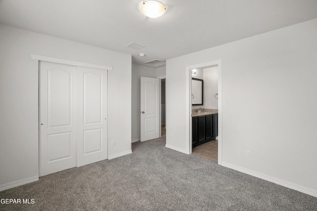 1669 Sam Dominguez, El Paso, TX 79928 - unfurnished bedroom with carpet flooring, a closet, baseboards, and connected bathroom