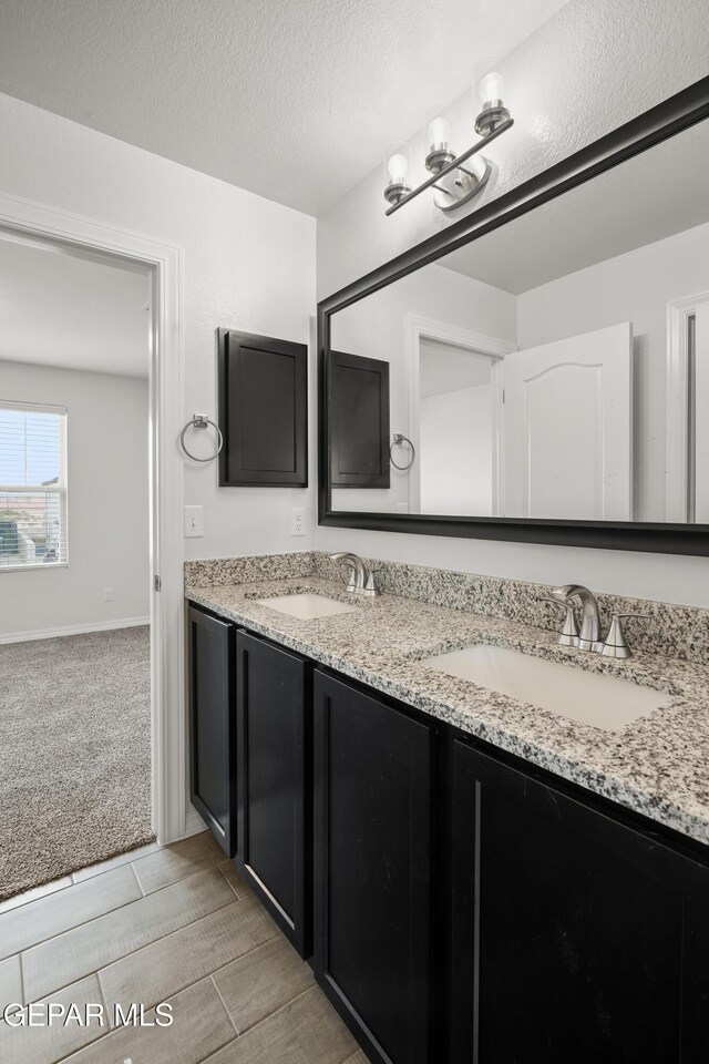 1669 Sam Dominguez, El Paso, TX 79928 - full bathroom with double vanity