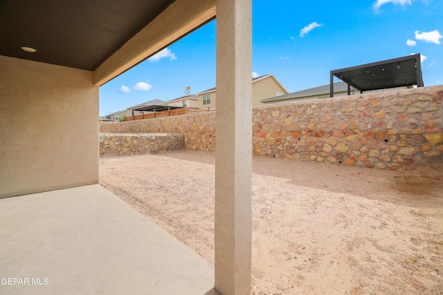 1669 Sam Dominguez, El Paso, TX 79928 - fenced backyard featuring a patio