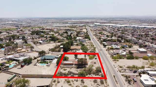 1126 Loma Verde Dr, El Paso, TX 79936 - aerial view of residential area with property boundaries highlighted and a pool area