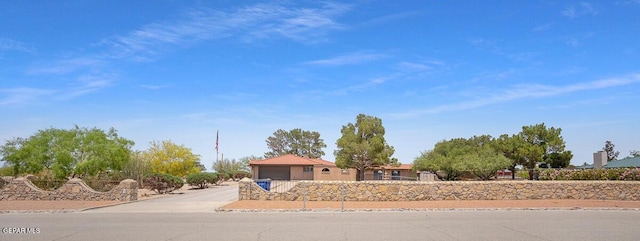 1126 Loma Verde Dr, El Paso, TX 79936 - ranch-style house with a garage and driveway