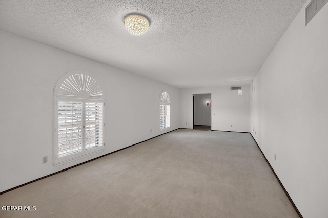 1126 Loma Verde Dr, El Paso, TX 79936 - carpeted spare room featuring a textured ceiling