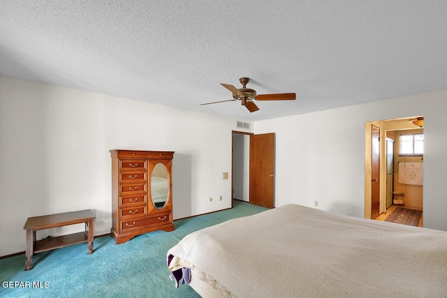 1126 Loma Verde Dr, El Paso, TX 79936 - bedroom with carpet floors, ceiling fan, connected bathroom, and a textured ceiling