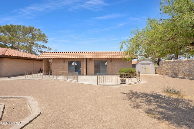 1126 Loma Verde Dr, El Paso, TX 79936 - view of front of home with a tile roof and a patio area