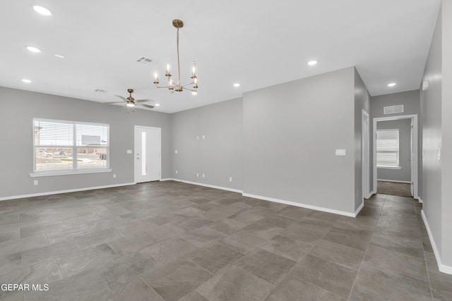 13865 Summer Wave Ave, Horizon City, TX 79928 - empty room with a chandelier, baseboards, ceiling fan, recessed lighting, and tile patterned floors