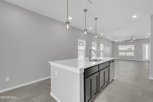 13865 Summer Wave Ave, Horizon City, TX 79928 - kitchen featuring a sink, stainless steel dishwasher, a ceiling fan, light countertops, and open floor plan