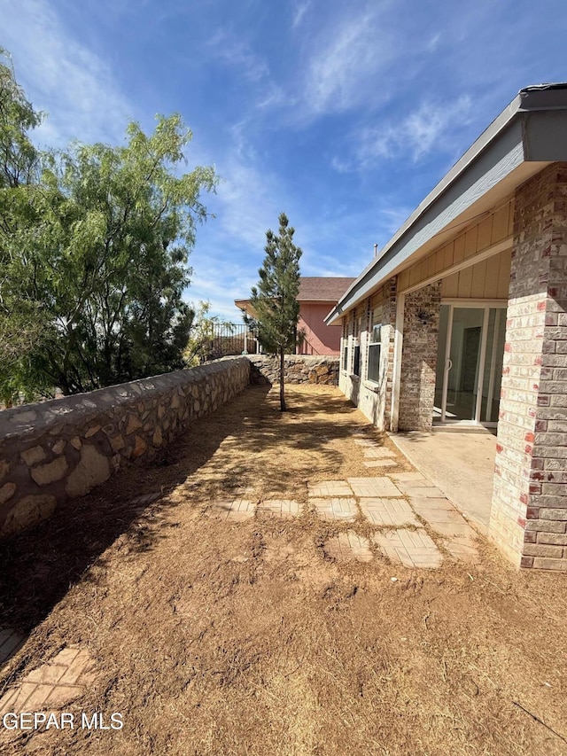 6840 Ridge Top Dr, El Paso, TX 79904 - view of yard with a patio area