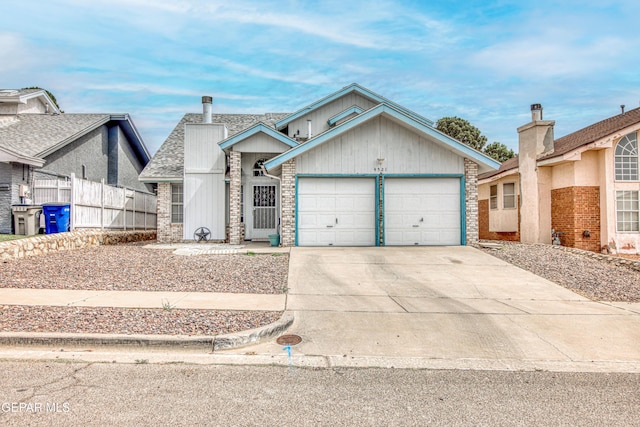 4521 Loma De Plata Dr, El Paso, TX 79934 - view of front of property featuring a garage and concrete driveway