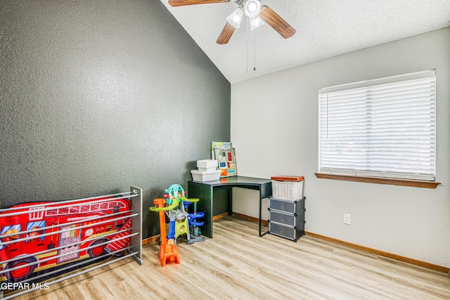 4521 Loma De Plata Dr, El Paso, TX 79934 - bedroom with wood finished floors, vaulted ceiling, ceiling fan, and baseboards