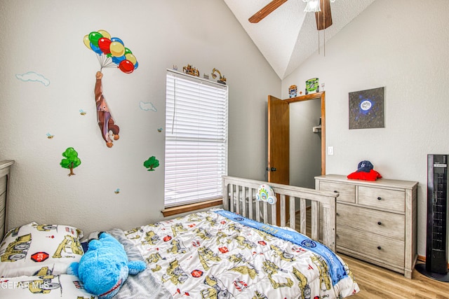 4521 Loma De Plata Dr, El Paso, TX 79934 - bedroom featuring light wood-style floors, lofted ceiling, and a ceiling fan