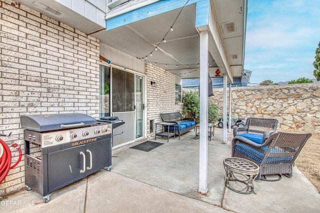 4521 Loma De Plata Dr, El Paso, TX 79934 - view of patio with grilling area and an outdoor hangout area