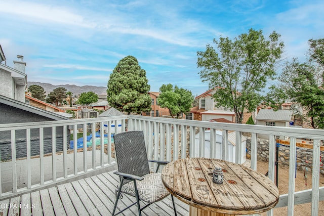 4521 Loma De Plata Dr, El Paso, TX 79934 - wooden deck with a mountain view and a residential view
