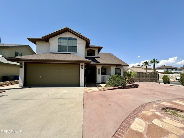 12399 Paseo Nuevo Dr, El Paso, TX 79928 - traditional home featuring driveway, an attached garage, stucco siding, and roof with shingles