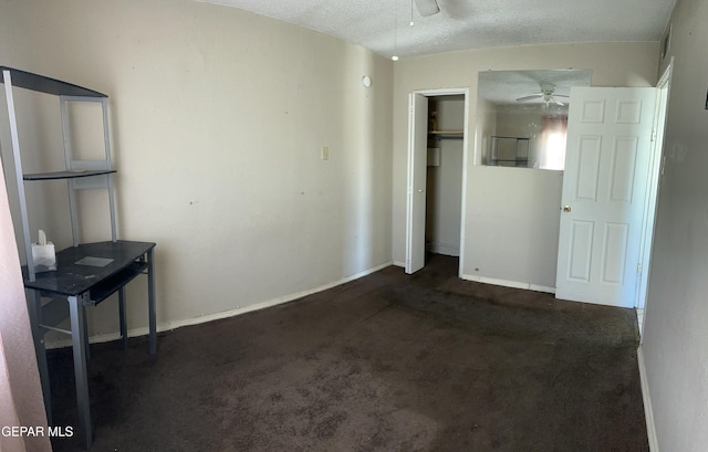 7800 Monterrey Dr, El Paso, TX 79915 - unfurnished bedroom featuring a closet, carpet, baseboards, and a textured ceiling