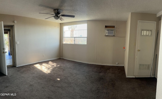 7800 Monterrey Dr, El Paso, TX 79915 - carpeted spare room with ceiling fan, a textured ceiling, and a wall mounted air conditioner