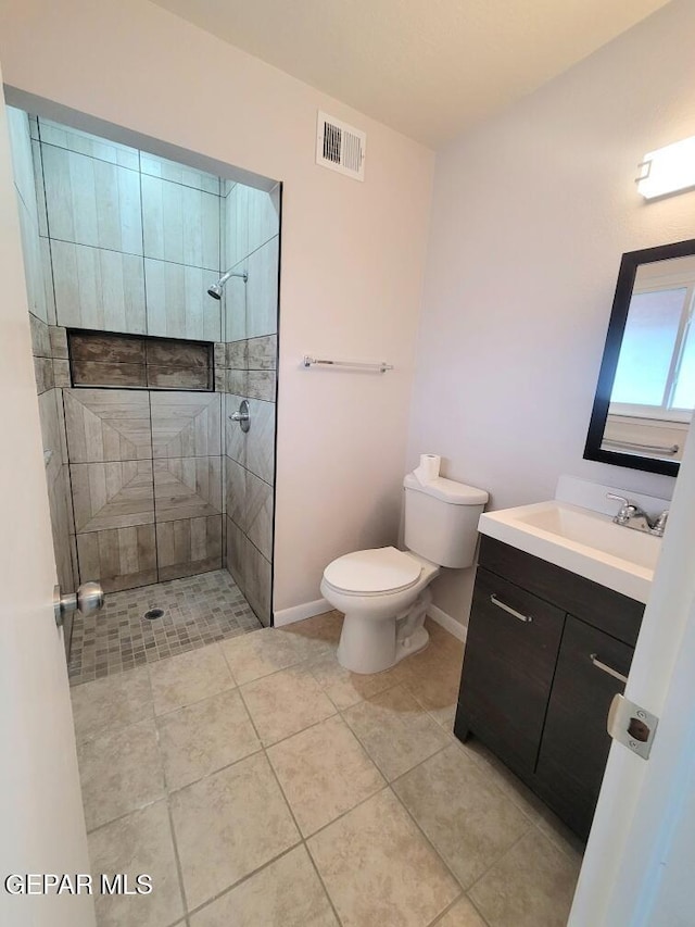 2916 Beachcomber, El Paso, TX 79936 - full bath with vanity, toilet, walk in shower, baseboards, and tile patterned flooring